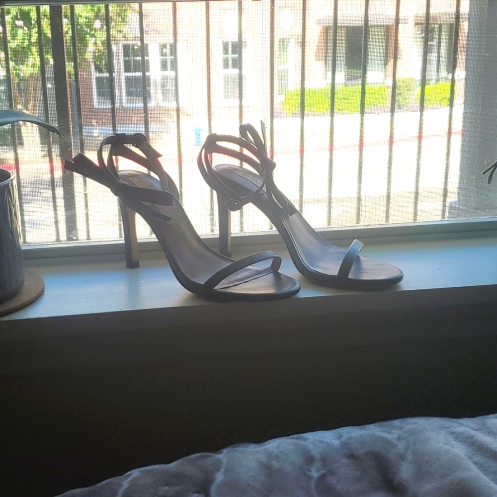 Black Deltan heels